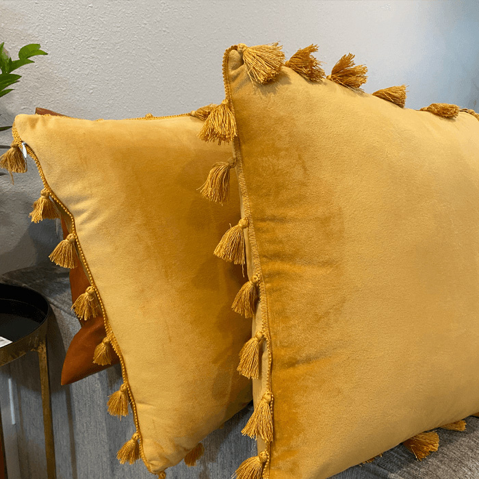 Gold tassel pillows